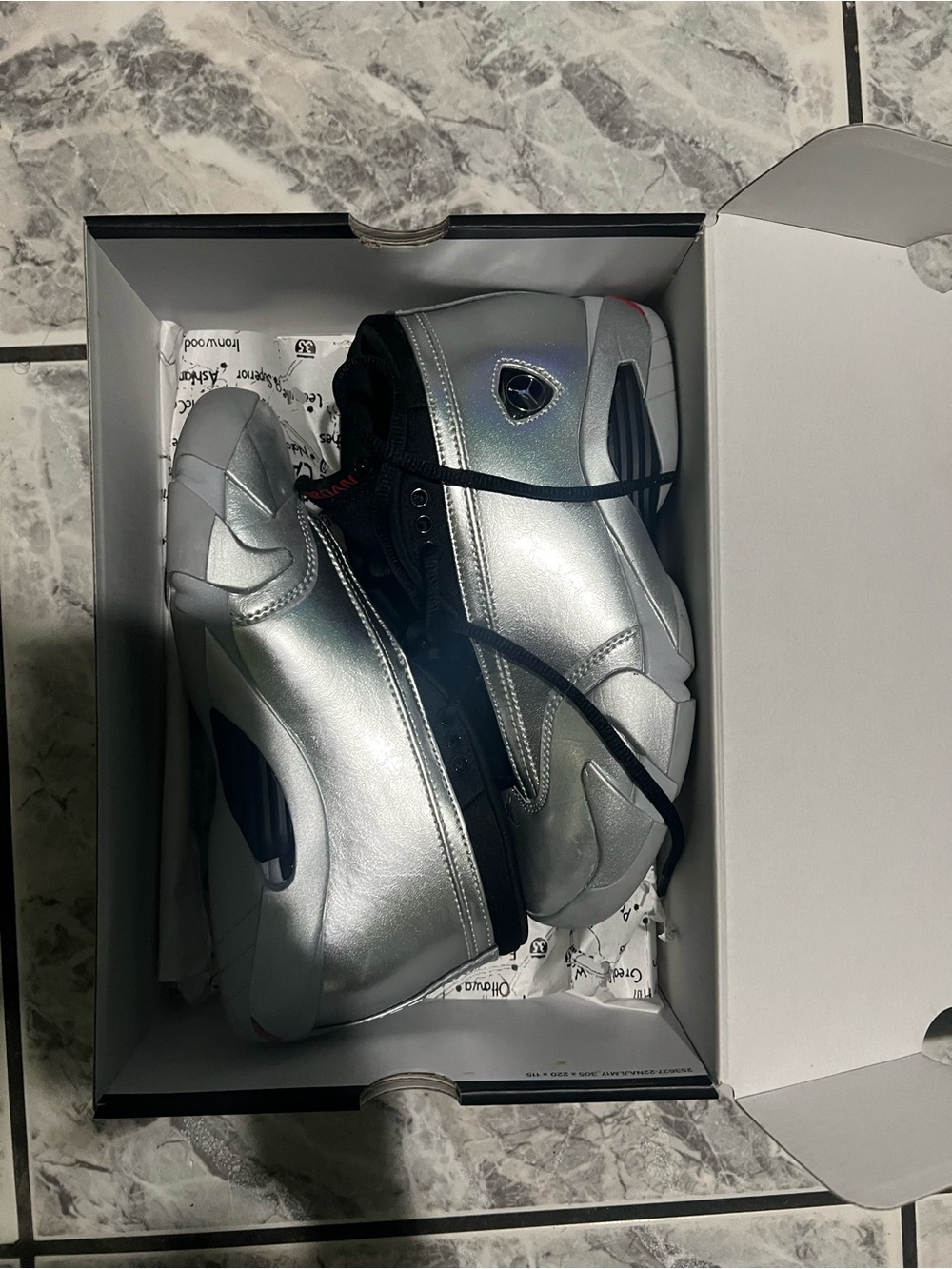 Jordan Silver and Black Low-Top Sneakers